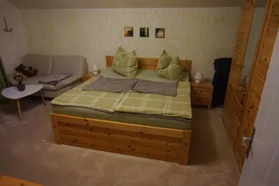Ein Bett oder Betten in einem Zimmer der Unterkunft Ferienwohnung Daniela