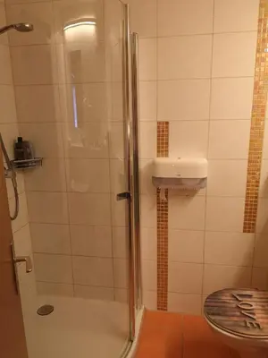 Ein Badezimmer in der Unterkunft Hotel Wirt Z'Minsta