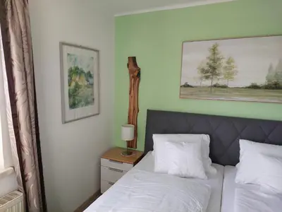 Ein Bett oder Betten in einem Zimmer der Unterkunft Wohnung mit Charme in Pinsdorf