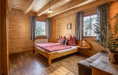 Ein Bett oder Betten in einem Zimmer der Unterkunft Charmante Berghuette