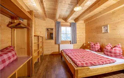 Ein Bett oder Betten in einem Zimmer der Unterkunft Charmante Berghuette