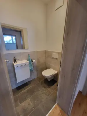 Ein Badezimmer in der Unterkunft Haus Holzmann