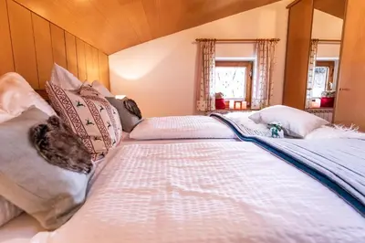 Ein Bett oder Betten in einem Zimmer der Unterkunft Holiday im Gästehaus Warter in Altenmarkt