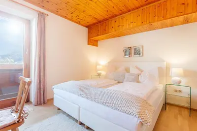 Ein Bett oder Betten in einem Zimmer der Unterkunft Holiday im Gästehaus Warter in Altenmarkt