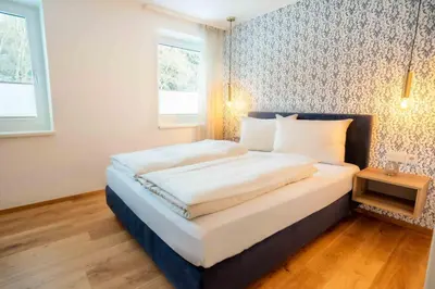 Ein Bett oder Betten in einem Zimmer der Unterkunft Kaminzimmer Suite