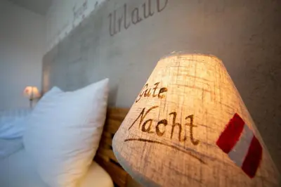 Ein Bett oder Betten in einem Zimmer der Unterkunft Ferienwohnungen Waltraud Trinker, Haus
