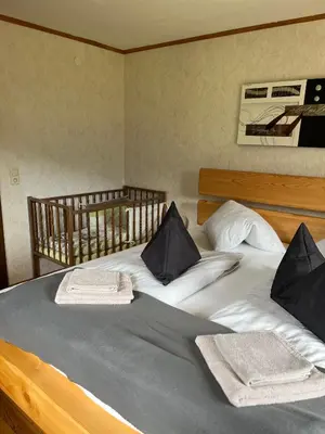 Ein Bett oder Betten in einem Zimmer der Unterkunft Gut Schablberg