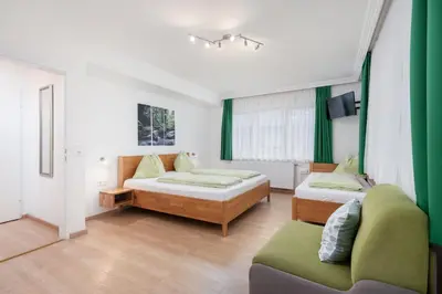Ein Bett oder Betten in einem Zimmer der Unterkunft Apartments Frauenschuh
