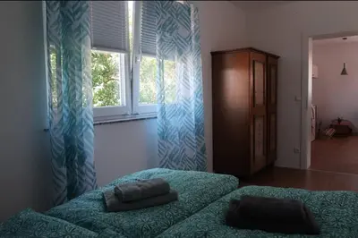 Ein Bett oder Betten in einem Zimmer der Unterkunft Grüner Baum ferienwohnung
