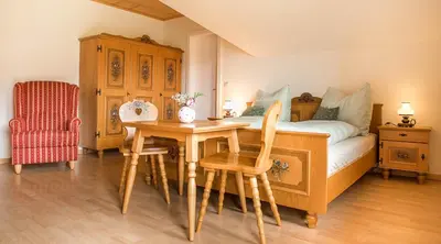 Ein Bett oder Betten in einem Zimmer der Unterkunft Ferienhaus Mehlhartl