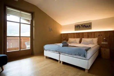 Ein Bett oder Betten in einem Zimmer der Unterkunft Schneckenhaus Dachstein West