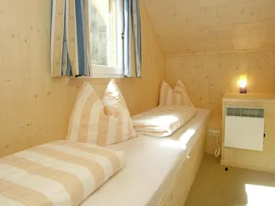 Ein Bett oder Betten in einem Zimmer der Unterkunft Chalet Stadl an der Mur near Ski Slopes