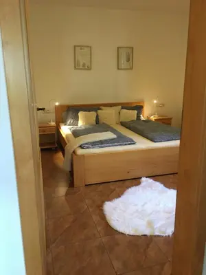 Ein Bett oder Betten in einem Zimmer der Unterkunft Sonnenweg Apartments