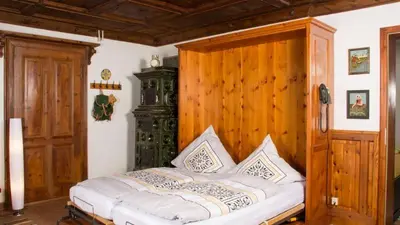 Ein Bett oder Betten in einem Zimmer der Unterkunft KraftTanken direkt am See