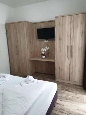 Ein Bett oder Betten in einem Zimmer der Unterkunft CityApartment MONIKA