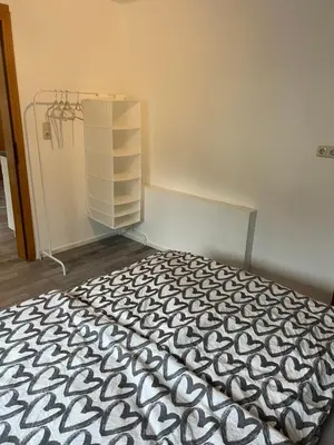 Ein Bett oder Betten in einem Zimmer der Unterkunft Nice Flat in Gmunden
