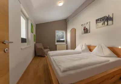 Ein Bett oder Betten in einem Zimmer der Unterkunft Appartement Schneider by Schladming-Appartements