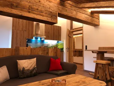Ein Sitzbereich in der Unterkunft Haus Tannenheim