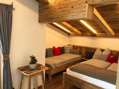 Ein Bett oder Betten in einem Zimmer der Unterkunft Haus Tannenheim