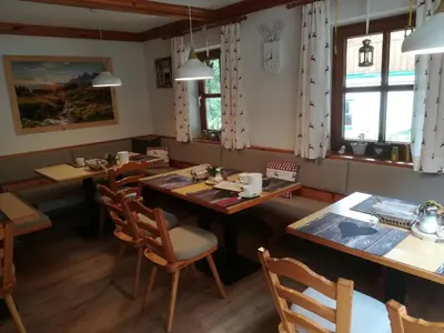 Ein Sitzbereich in der Unterkunft Haus Bergliebe