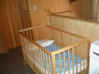 Ein Bett oder Betten in einem Zimmer der Unterkunft Almrauschhütte Markus