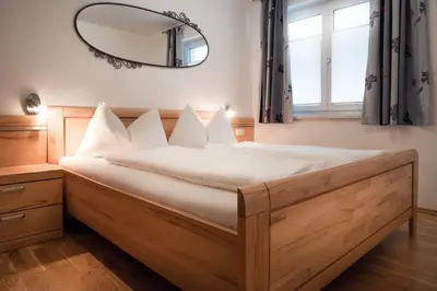 Ein Bett oder Betten in einem Zimmer der Unterkunft Terrassen-Appartement Held by Schladming-Appartements