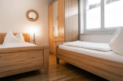 Ein Bett oder Betten in einem Zimmer der Unterkunft Terrassen-Appartement Held by Schladming-Appartements