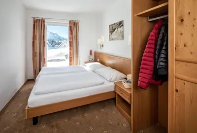 Ein Bett oder Betten in einem Zimmer der Unterkunft Fewo-Obertauern-Steinadler