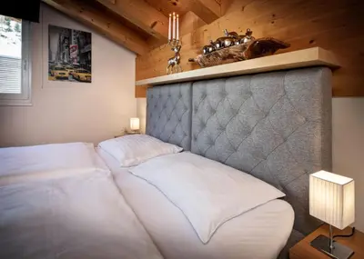 Ein Bett oder Betten in einem Zimmer der Unterkunft Fewo-Obertauern Alps