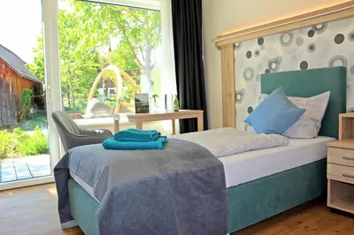 Ein Bett oder Betten in einem Zimmer der Unterkunft Adelwöhrer - Am Hof