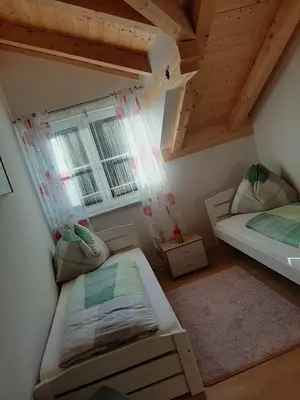 Ein Bett oder Betten in einem Zimmer der Unterkunft Ferienwohnung Christine