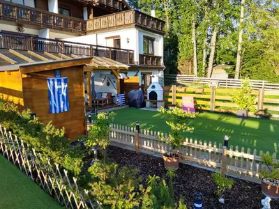 Ein Garten an der Unterkunft Bergidyll Top 1 Gartenwohnung