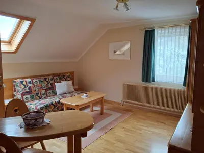 Ein Sitzbereich in der Unterkunft Fanningerwirt Holzer