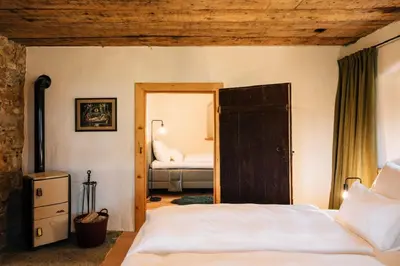 Ein Bett oder Betten in einem Zimmer der Unterkunft BAUERNHAUS DÖRFL IN DER STRASS