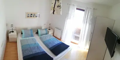 Ein Bett oder Betten in einem Zimmer der Unterkunft Haus Barbara