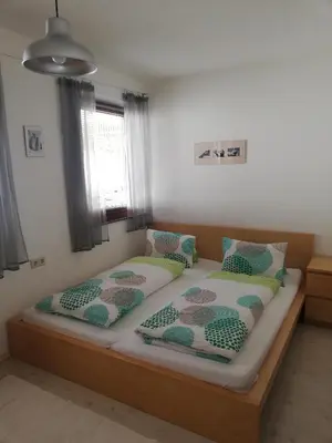 Ein Bett oder Betten in einem Zimmer der Unterkunft Haus Barbara