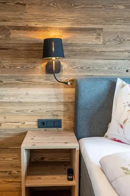 Ein Bett oder Betten in einem Zimmer der Unterkunft Chalet Kulmberg