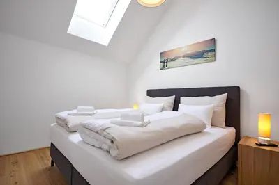 Ein Bett oder Betten in einem Zimmer der Unterkunft die Tauplitz Lodges - Alm Lodge A13 by AA Holiday Homes