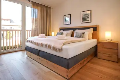 Ein Bett oder Betten in einem Zimmer der Unterkunft die Tauplitz Lodges - Alm Lodge A5 by AA Holiday Homes