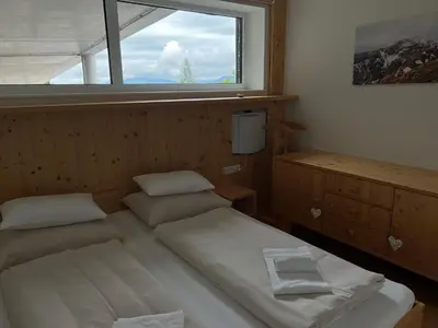 Ein Bett oder Betten in einem Zimmer der Unterkunft Apartment Fastenberg Schladming - Top11 by AA Holiday Homes