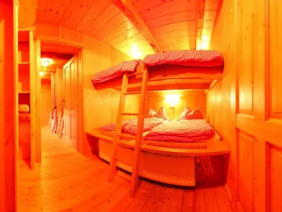 Ein Bett oder Betten in einem Zimmer der Unterkunft Schermerhütten