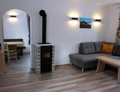 Ein Sitzbereich in der Unterkunft Alpenvereinshaus Pruggern