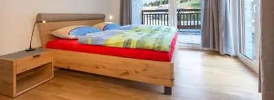 Ein Bett oder Betten in einem Zimmer der Unterkunft Ski In Ski Out Apartment Fastenberg Top 2 by AA Holiday Homes