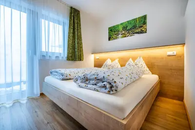 Ein Bett oder Betten in einem Zimmer der Unterkunft WiWa Appartement