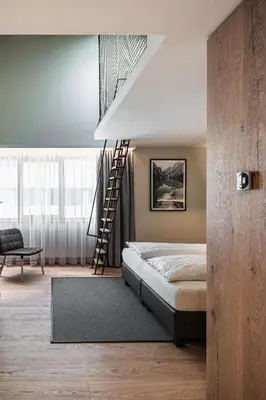 Ein Bett oder Betten in einem Zimmer der Unterkunft Stadthotel Goldenes Schiff
