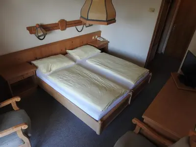 Ein Bett oder Betten in einem Zimmer der Unterkunft Hotel Carossa bed&breakfast
