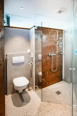 Ein Badezimmer in der Unterkunft Seehotel Brandauer's Villen