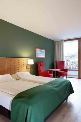 Ein Bett oder Betten in einem Zimmer der Unterkunft SPA Hotel Erzherzog Johann