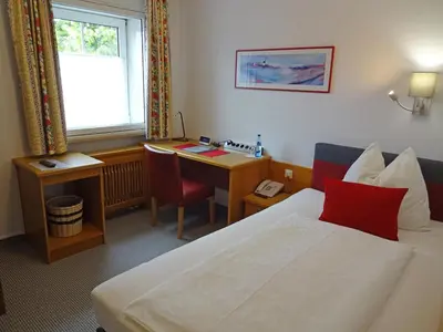 Ein Bett oder Betten in einem Zimmer der Unterkunft Hotel Schlair