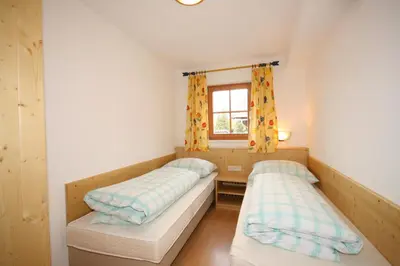 Ein Bett oder Betten in einem Zimmer der Unterkunft Appartement Steinacher